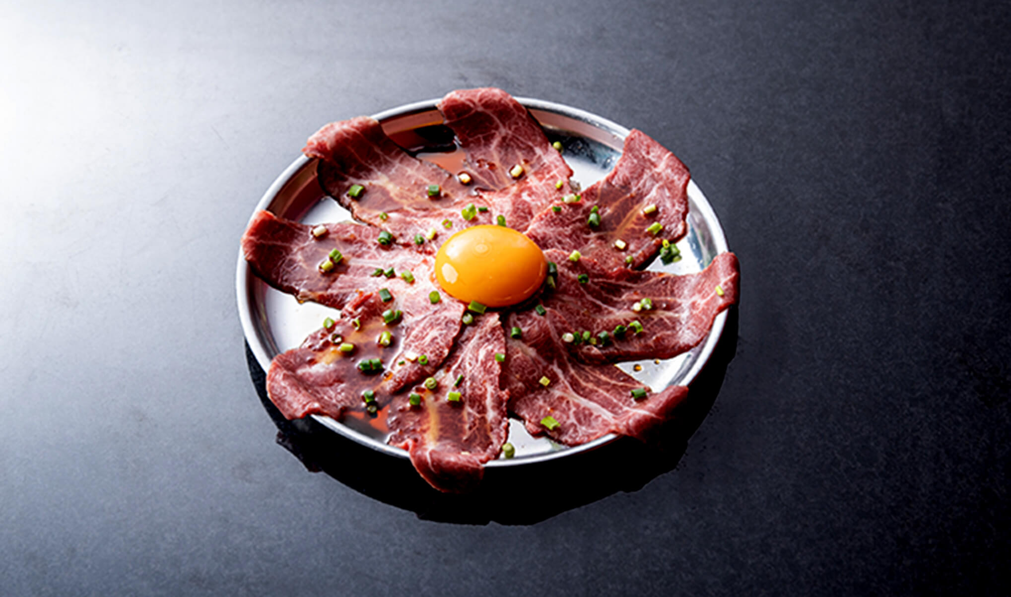 ツラミの炙りユッケ